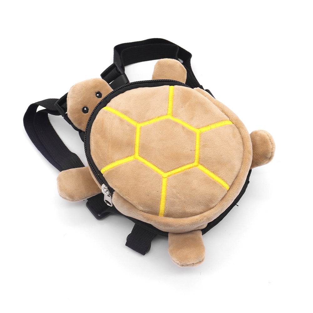 Mochila de cachorro pequena em forma de tartaruga, de veludo castanho claro com detalhes amarelos, com alças ajustáveis.