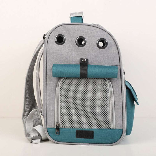 Mochila cinza e azul para animais de estimação, com material respirável e redes laterais, apropriada para transportes.
