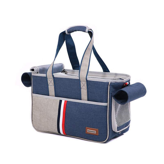 Bolsa para gatos e cães com design em sarja, nas cores azul escuro e cinza, com alças e rede para ventilação.