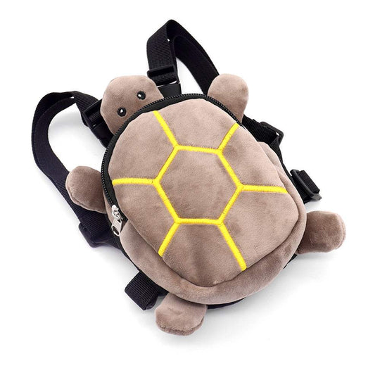 Mochila de pelúcia em forma de tartaruga, com detalhes em amarelo e alças ajustáveis. Ideal para pequenos animais de estimação.