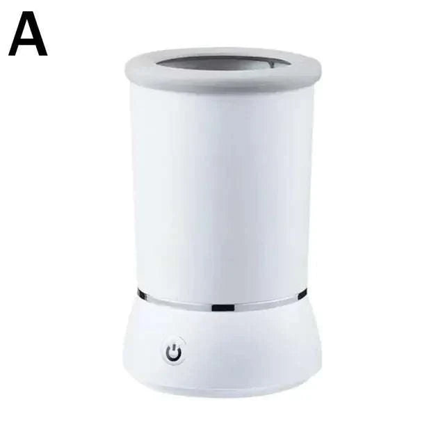 Lavador de patas automático para animais de estimação, em branco, com design cilíndrico e botão de funcionamento na base.