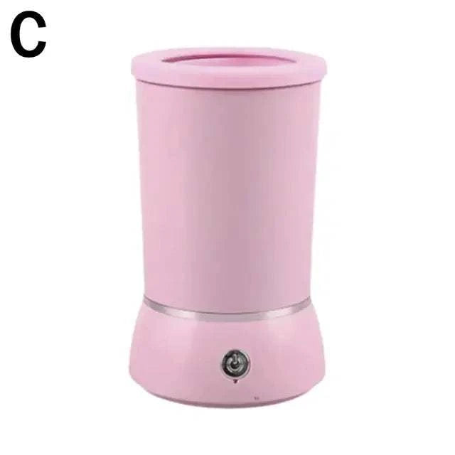 Copo limpador automático de patas de cão, em rosa, design cilíndrico com base arredondada e botão de operação.