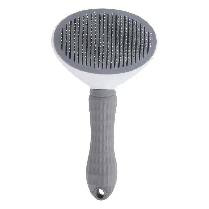 Escova de pelos de animais com cabo cinza e superfície de borracha, projetada para remover pelos soltos e nódoas.